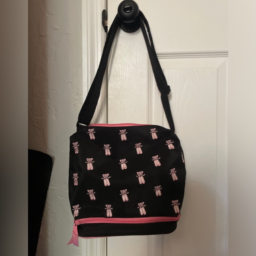 black and pink bag with ballerina slippers